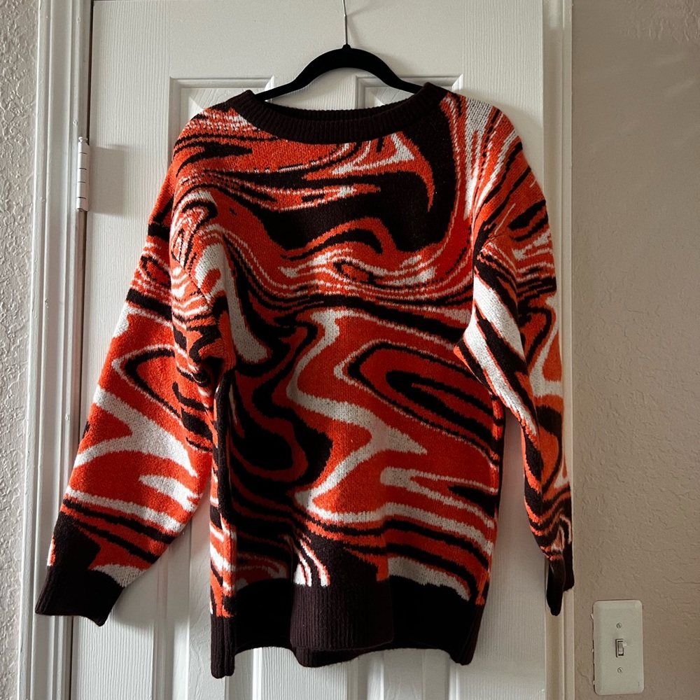Oversized orange and brown swirl sweater